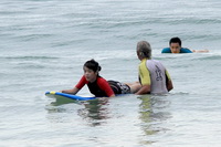 surfing instructor will always be in the water with you